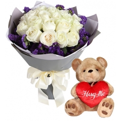 Send 12 white roses with cute teddy bear with heart
