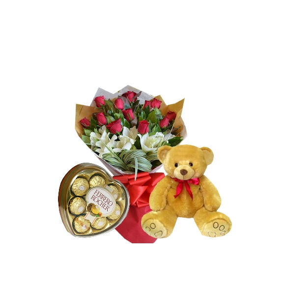 red roses with lilies in a bouquet with